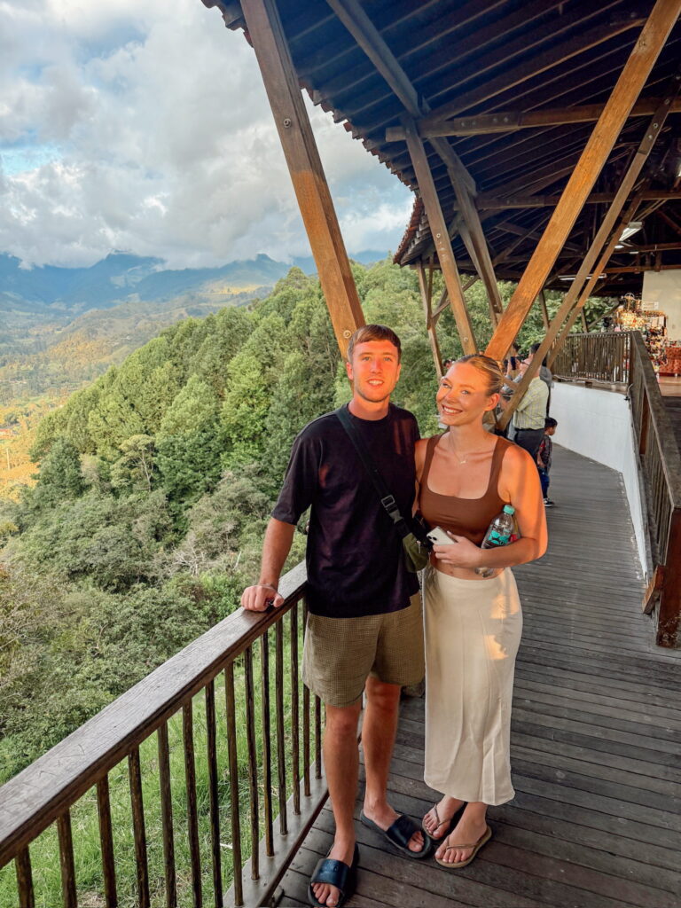 Panoramic view from the Mirador viewpoint in Salento, Colombia, overlooking colorful rooftops and the surrounding coffee region.