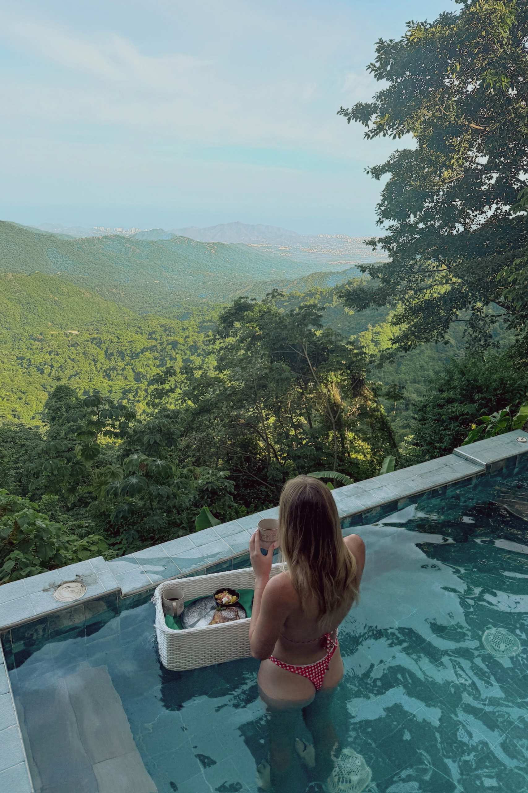 Relaxing in the pool with a floating breakfast and mountain views in Minca, Colombia