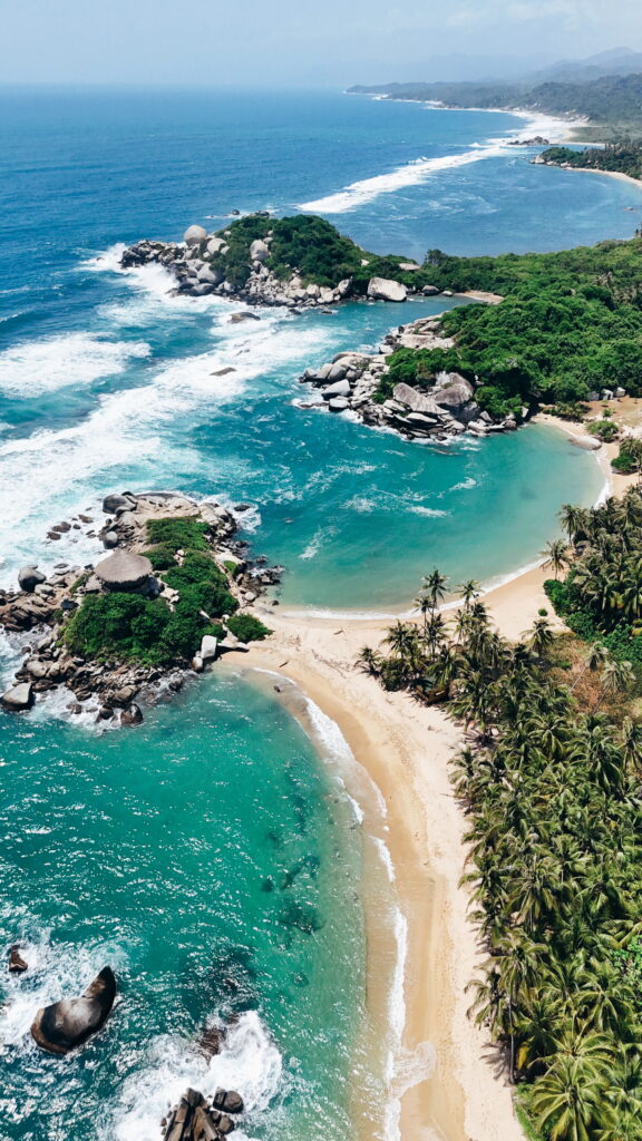 Sunset over Tayrona National Park coastline with Caribbean Sea and tropical forest