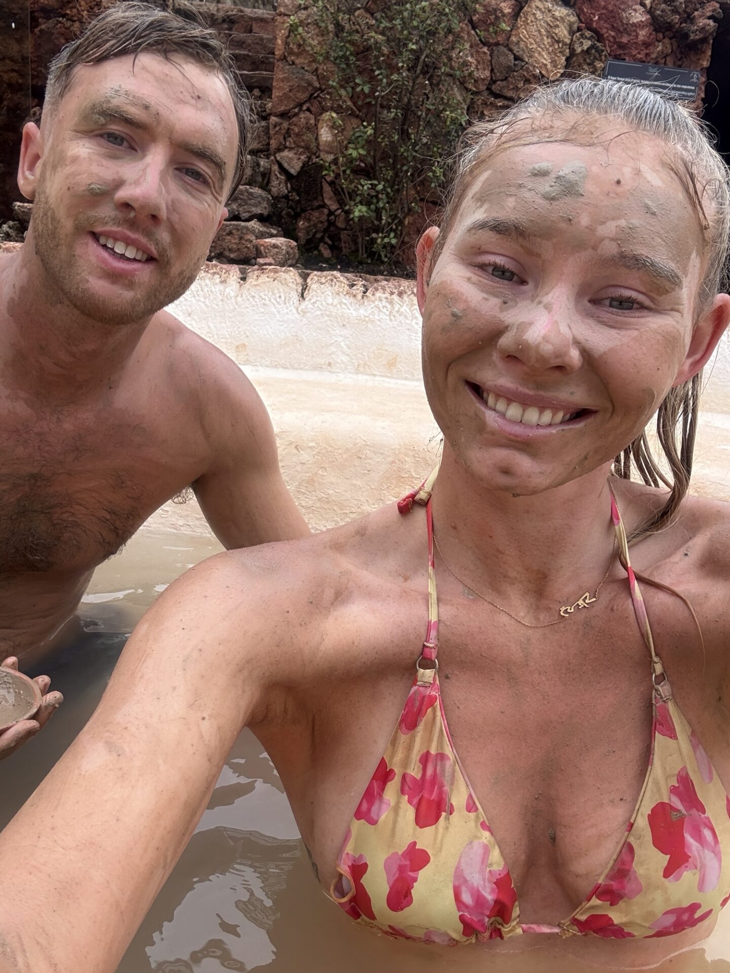 Katie and Luke backpacking around Ecuador at the famous spa in Cuenca in the mud baths.